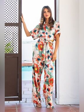 eesome, floral jump suit! Worn once! Size Large!
